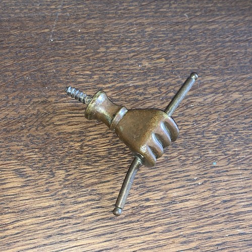 Antique clenched fist brass - fist,